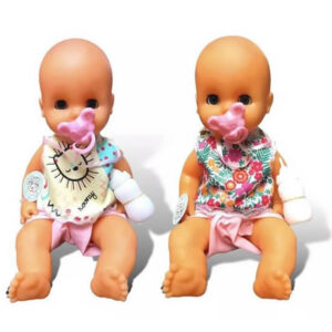 Bebe de goma con pañal,mamadera, remera y ojos movibles